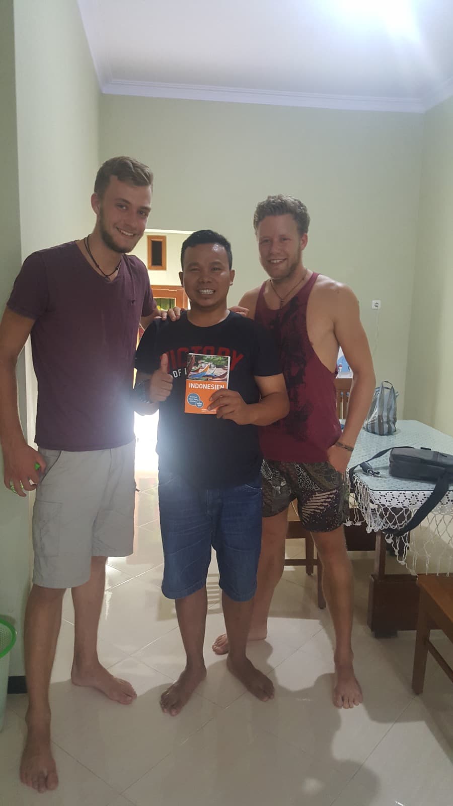 Mr. Sam with guests at Ijen Bondowoso Homestay, inspired by Stefan Loose travel guide